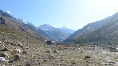 Scenic view of snowcapped mountains against sky