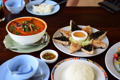 High angle view of food served on table