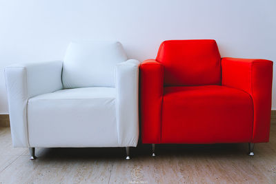 Red sofa on table at home