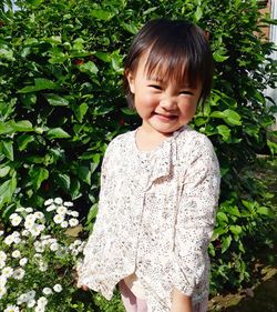 Close-up of cute girl with plants