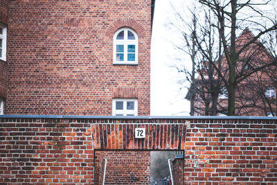 View of building and brick wall