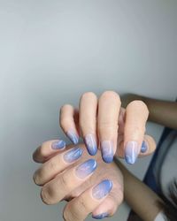 Close-up of person hand against white background