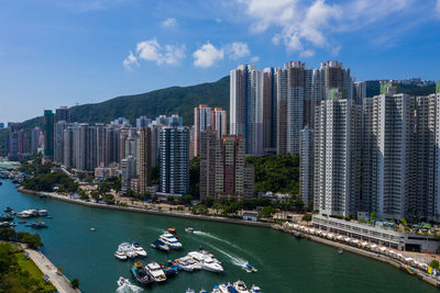 Panoramic view of city buildings against sky