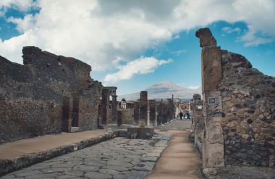 Old ruin building against cloudy sky
