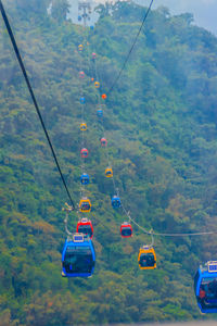 High angle view of overhead cable cars against mountain