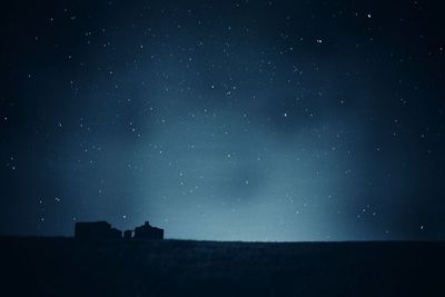 Low angle view of star field against sky at night