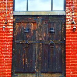 Closed wooden door of house