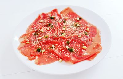 High angle view of strawberries in plate