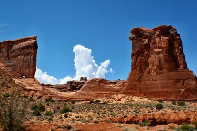 Low angle view of rocky mountains at arches national park