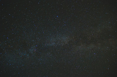 Low angle view of stars in sky at night