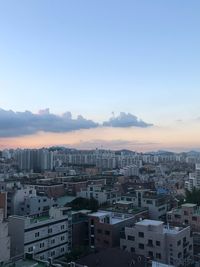 High angle view of townscape against sky during sunset