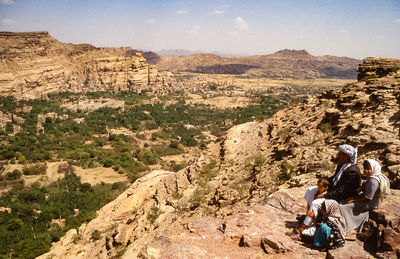 High angle view of people riding on mountain