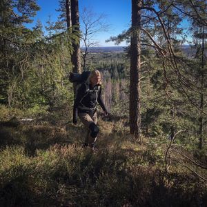 Female hiker in forest