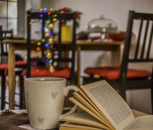 Close-up of coffee cup on table