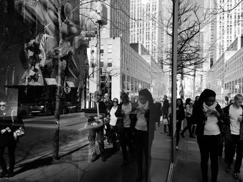 People walking on city street