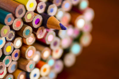 Bundle of colored pencils on table