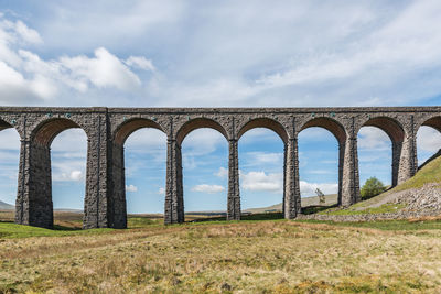 A perpendicular photography of the ribblehead viaduct while doing yorkshire three peaks challenge