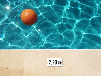 High angle view of text on swimming pool