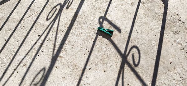 High angle view of shadow on sand