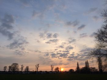 Scenic view of landscape at sunset