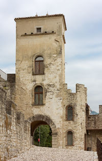 Low angle view of old building against sky