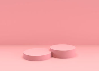 Close-up of empty pink candle on table