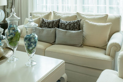 Close-up of sofa on table at home