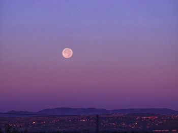 Scenic view of moon against sky at night