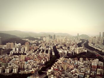 High angle shot of cityscape against clear sky