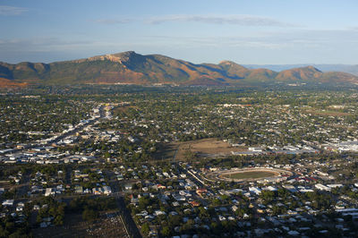 Aerial view on townsville city with mountain in distance - north queensland, australia