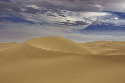 Scenic view of desert against sky