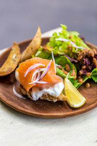 Close-up of food served in wooden plate