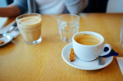 Close-up of coffee cup on table