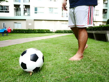 Low section of person on soccer field