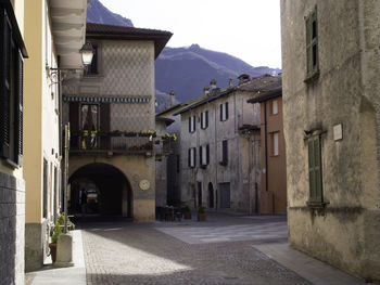 Alley amidst buildings in city