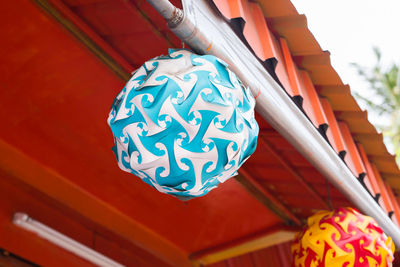 Low angle view of lanterns hanging on ceiling