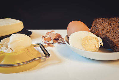 Close-up of breakfast served on table