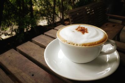 Close-up of cappuccino on table