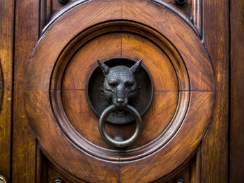 Close-up of sculpture on door
