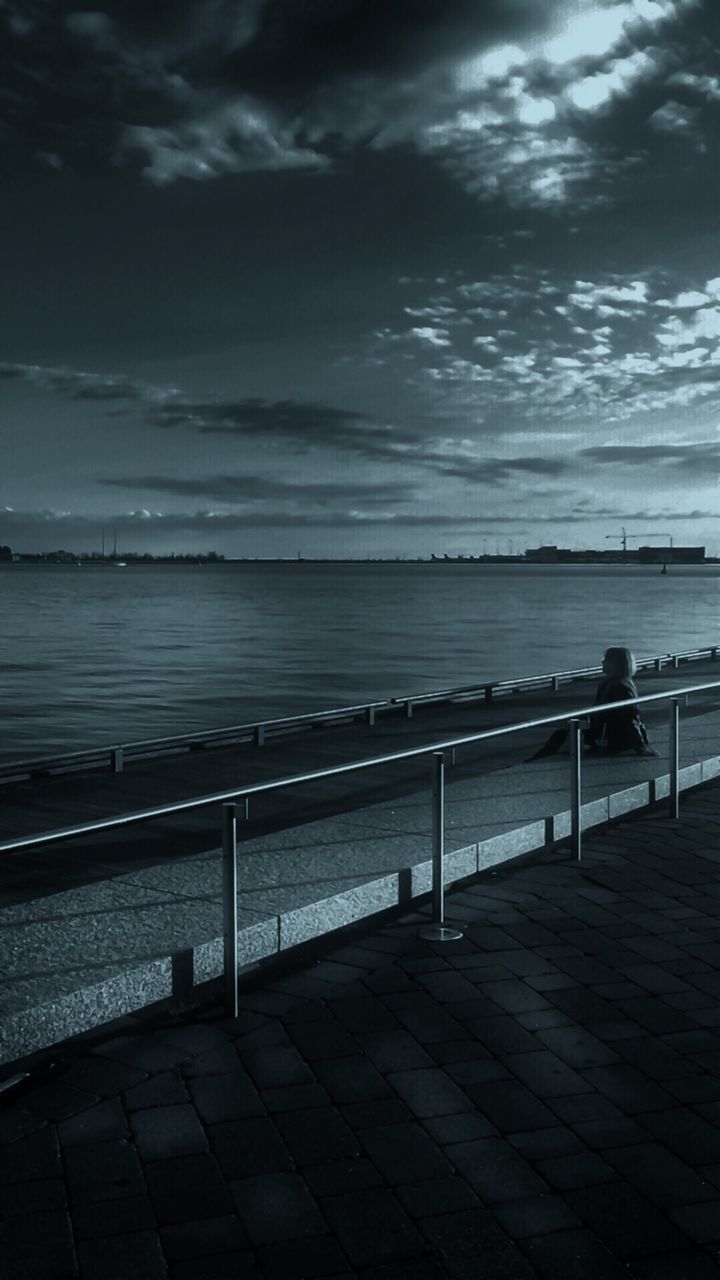 sea, water, sky, horizon over water, cloud - sky, railing, pier, tranquility, scenics, tranquil scene, beauty in nature, cloud, nature, cloudy, beach, built structure, idyllic, outdoors, shore, sunlight