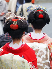 Rear view of japanese women on street