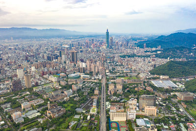 High angle view of city buildings against sky