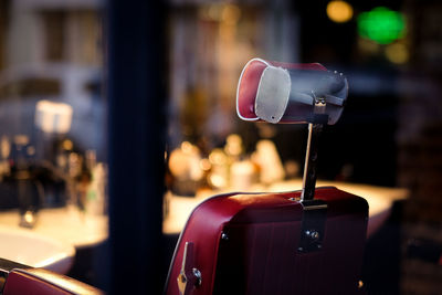 Close up of  barbers chair though window 