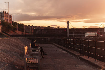 View of city against sky during sunset