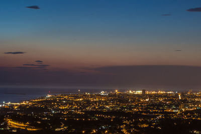 Aerial view of the city of livorno in tuscany at dusk.