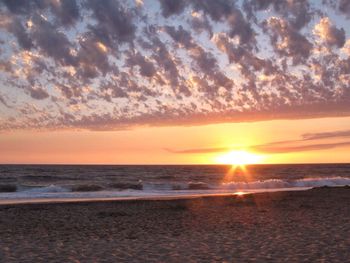 Scenic view of sea at sunset