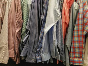 Full frame shot of multi colored shirts hanging on rack