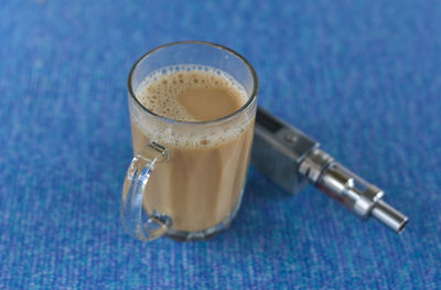 High angle view of coffee cup on table