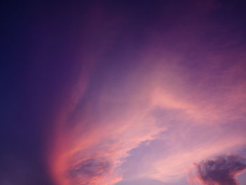 Low angle view of dramatic sky during sunset