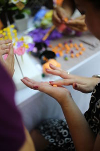 High angle view of woman hands